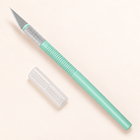 Mint green precision craft knife with fitted blade and protective cap