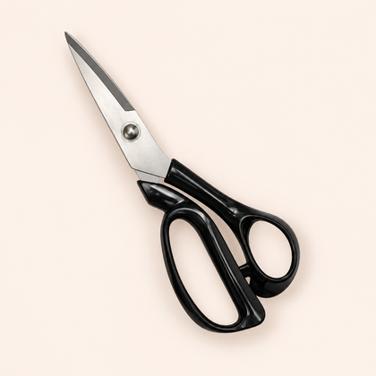 Black-handled stainless steel fabric shears